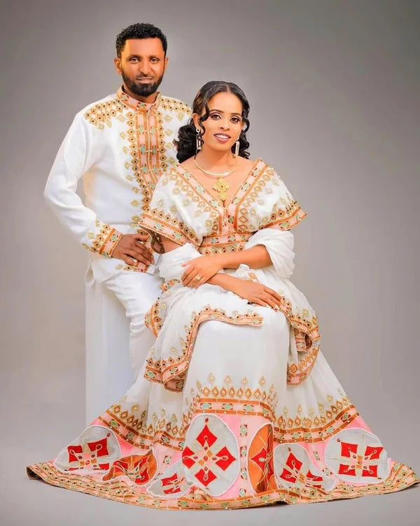 Colorful Modern Habesha Outfit: Stylish Couples Attire for Weddings.