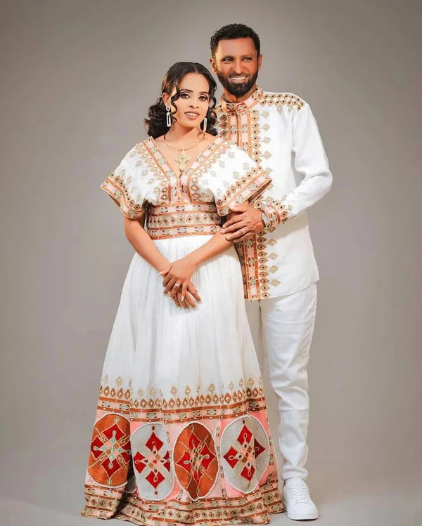 Colorful Modern Habesha Outfit: Stylish Couples Attire for Weddings.