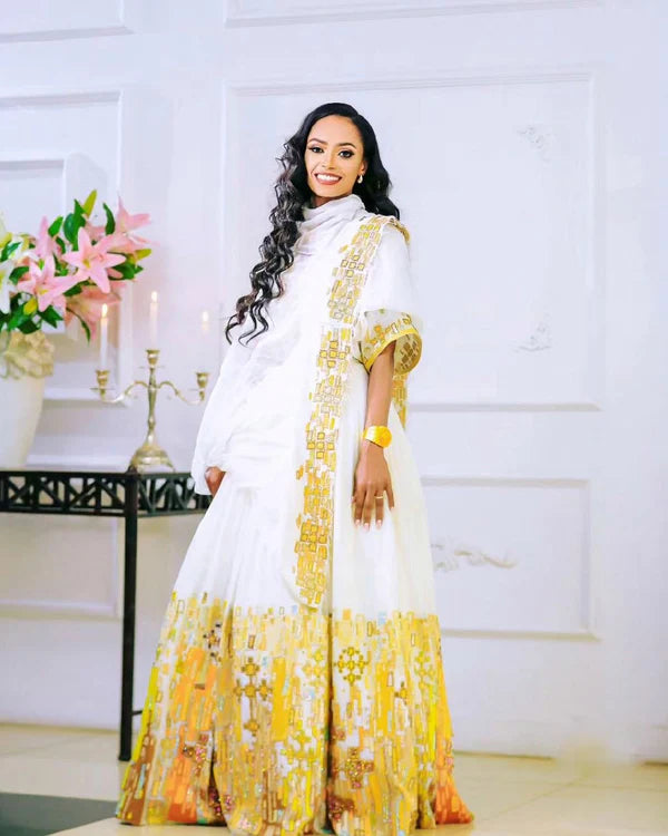 Gorgeous Yellow Habesha Couples Outfit for Traditional Weddings.