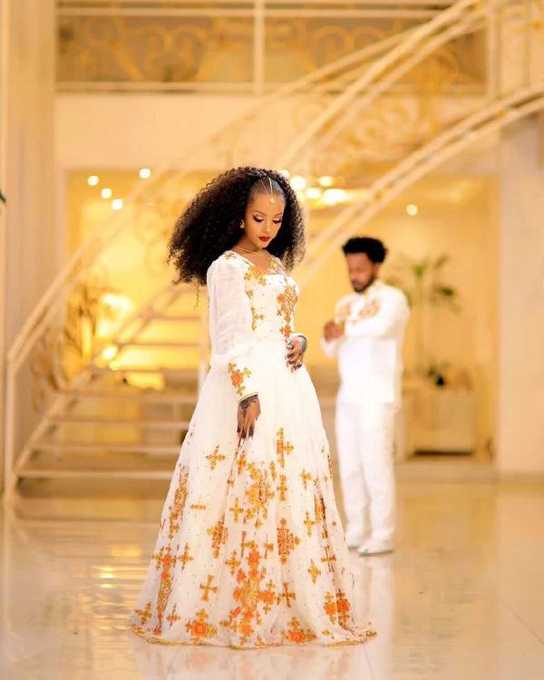 Beautiful Light-Color Design Habesha Couples Outfit for Traditional Weddings.