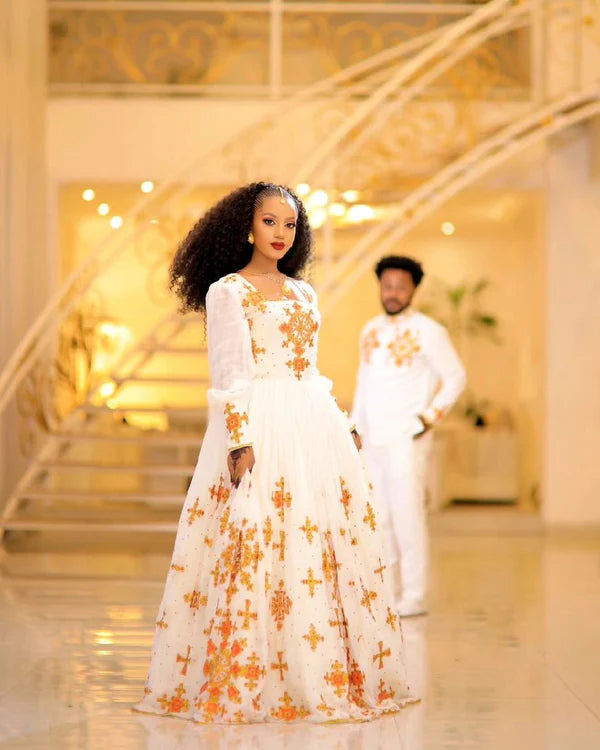Beautiful Light-Color Design Habesha Couples Outfit for Traditional Weddings.