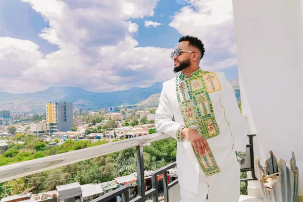 Splendid Light Green Traditional Habesha Shirt for Men: Elegantly Embellished with a Golden Cross