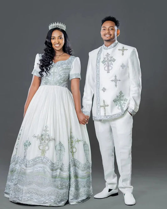Sophisticated Silver and Blue Habesha Couple's Outfit Contemporary Matching Wedding Ensemble