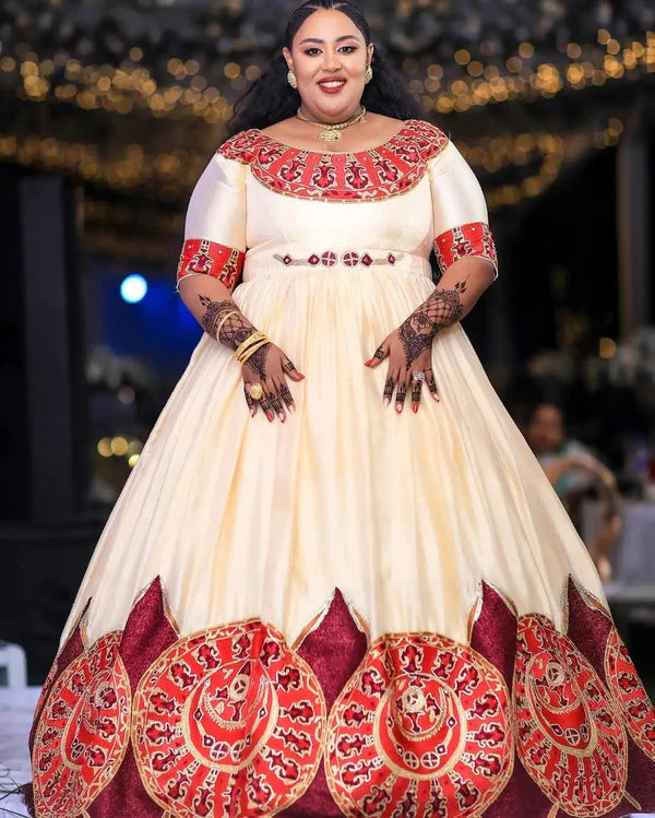 Radiant Red Habesha Couples Ensemble: Handcrafted Sophistication with Coordinated Wedding Wear