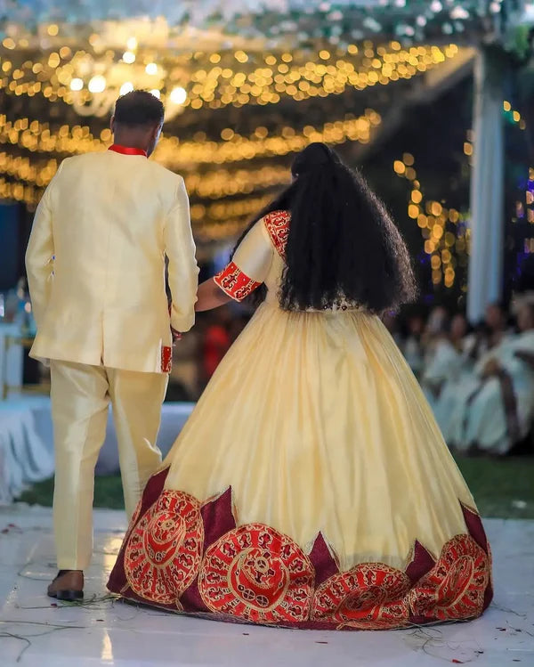 Radiant Red Habesha Couples Ensemble: Handcrafted Sophistication with Coordinated Wedding Wear