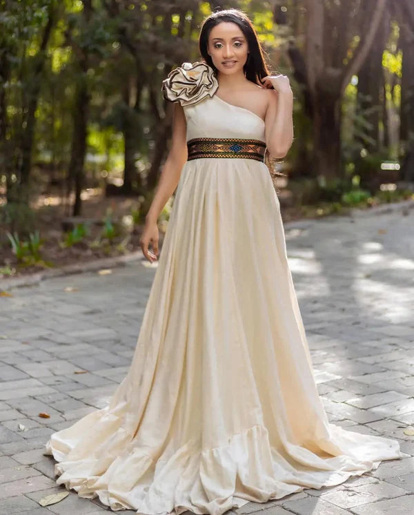Modern Beige Habesha Wedding Outfit: Stunning Chic Pattern Matching Couples Attire.