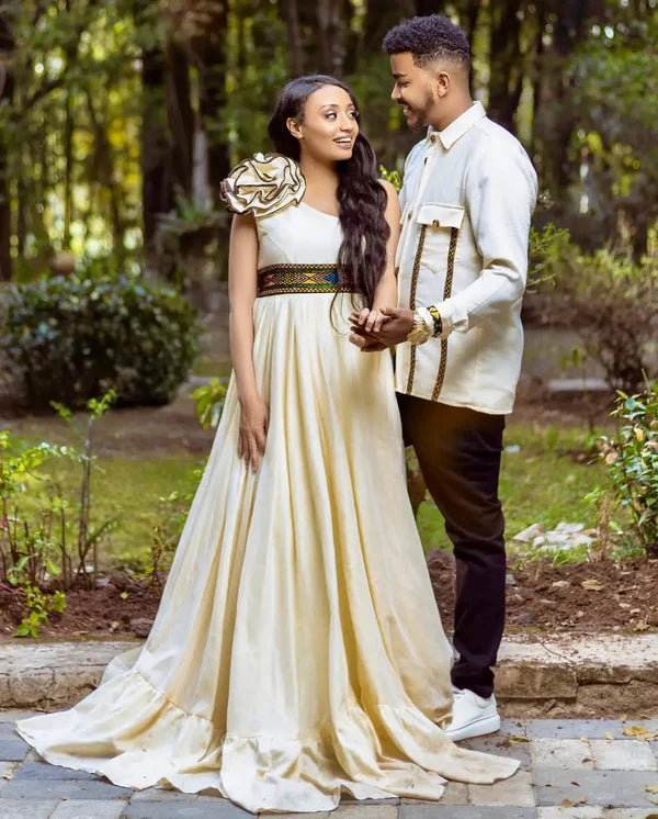 Modern Beige Habesha Wedding Outfit: Stunning Chic Pattern Matching Couples Attire.