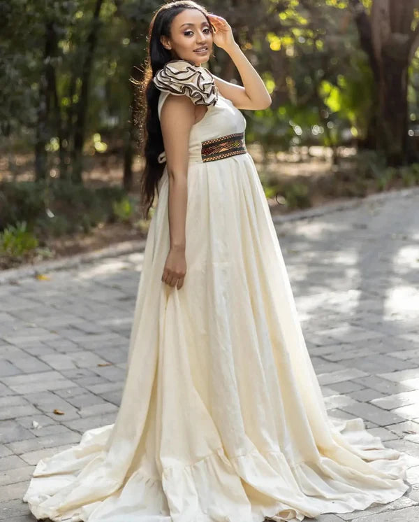 Modern Beige Habesha Wedding Outfit: Stunning Chic Pattern Matching Couples Attire.