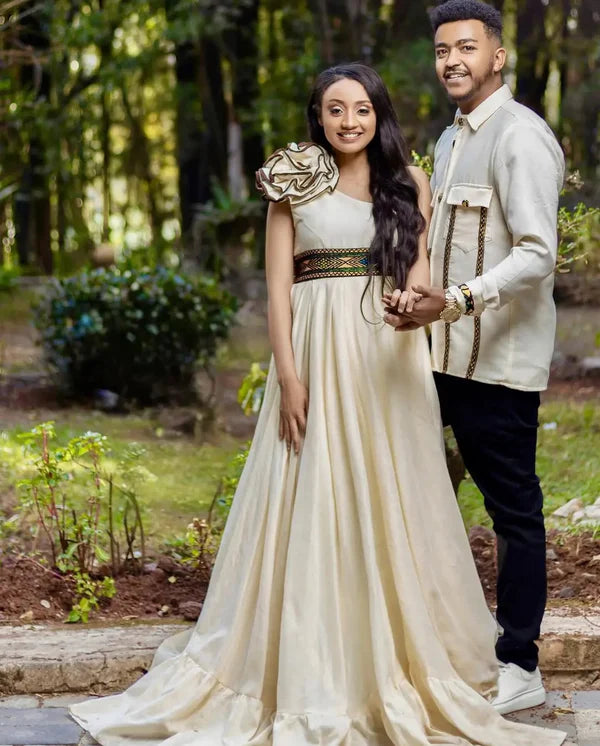 Modern Beige Habesha Wedding Outfit: Stunning Chic Pattern Matching Couples Attire.