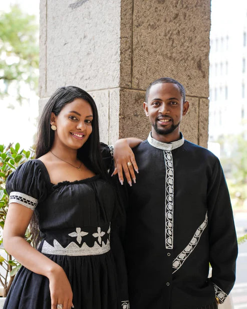 Harmonious Love in Black Matching Habesha Couples Outfit: Featuring Silver Handcrafted Embroidery
