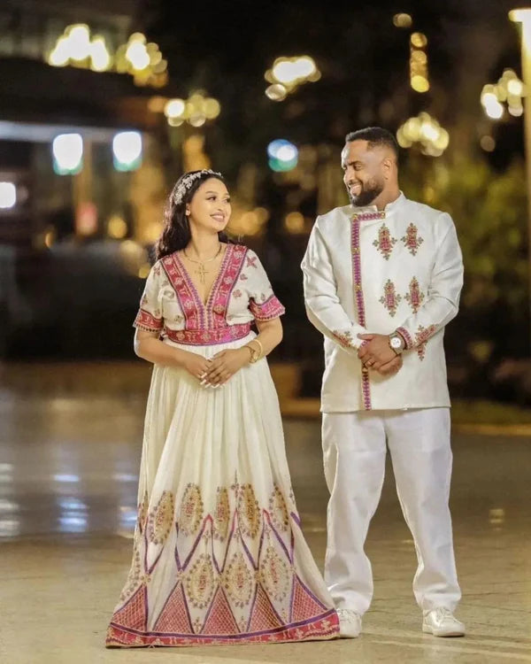 Unified Grace in Pink and Golden Habesha Outfit: Vibrant Minimalist Habesha Couples Matching Outfit