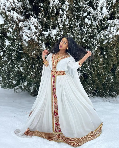 Vibrant Red Traditional Ethiopian Dress: Golden Handmade Ornaments.