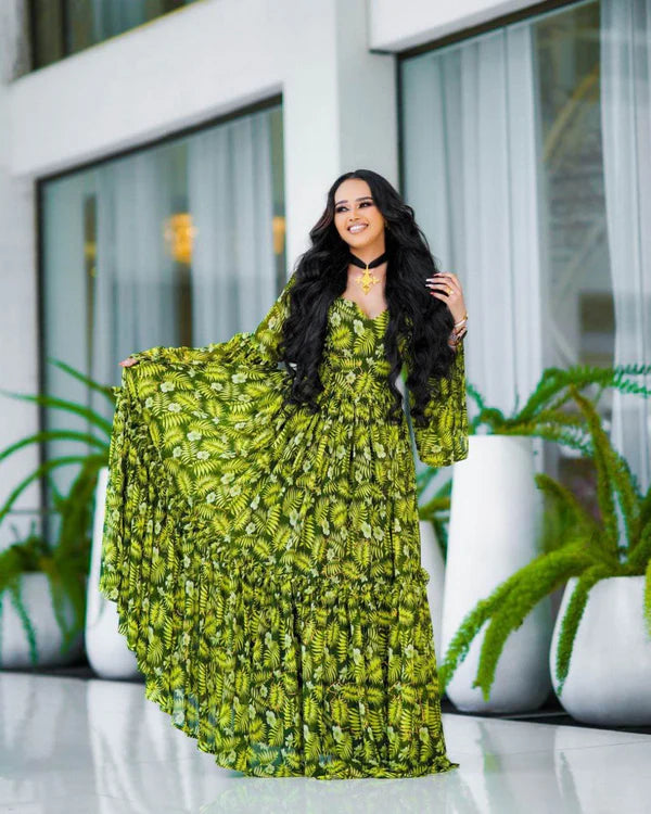 A captivating green Habesha chiffon dress