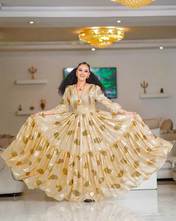 Stunning Beige Habesha Dress: Eye-Catching Golden Dot Details