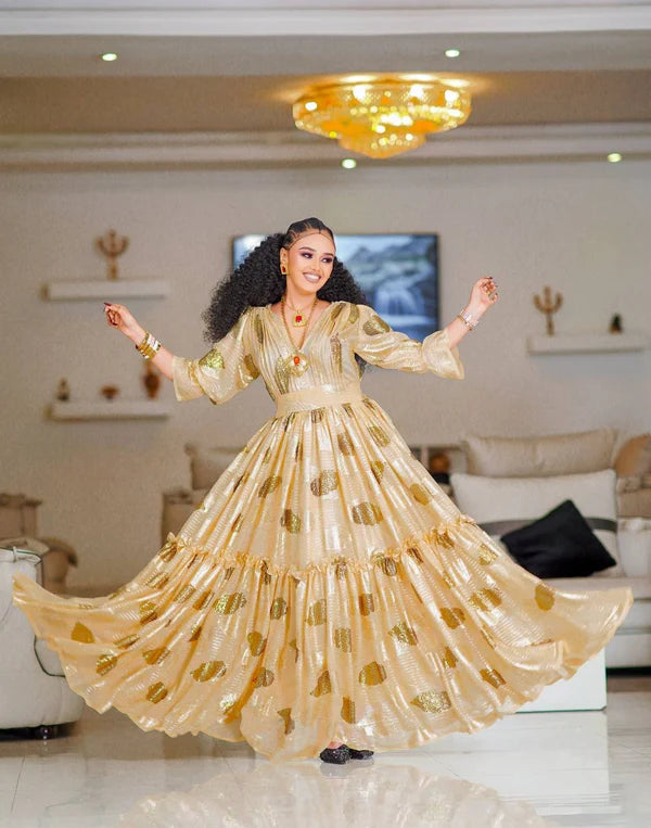 Stunning Beige Habesha Dress: Eye-Catching Golden Dot Details