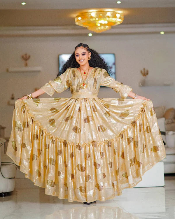 Stunning Beige Habesha Dress: Eye-Catching Golden Dot Details