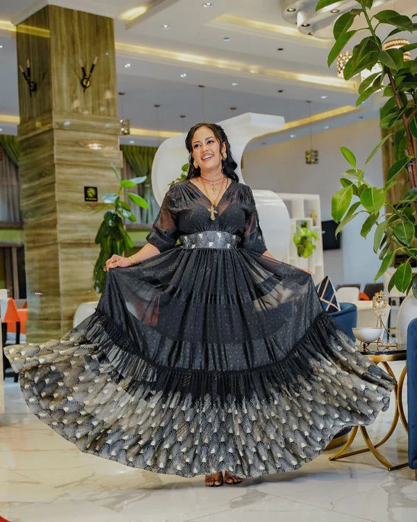 Black Elegance in Habesha Chiffon: with Eye-Catching Modern Design.