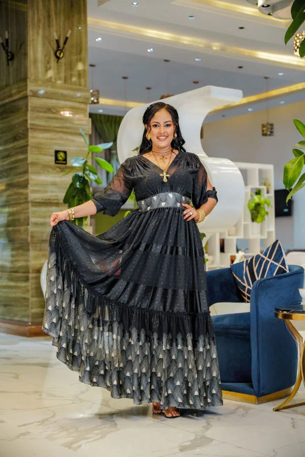 Black Elegance in Habesha Chiffon: with Eye-Catching Modern Design.