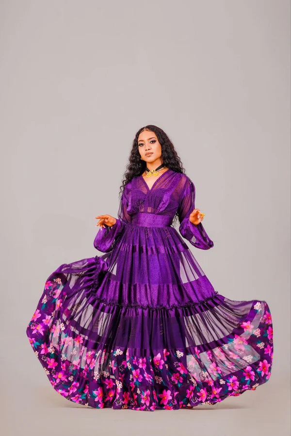 Purple Modern Habesha Chiffon Dress: with Exquisite Colorful Floral Design.