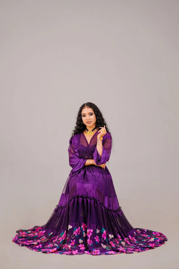Purple Modern Habesha Chiffon Dress: with Exquisite Colorful Floral Design.