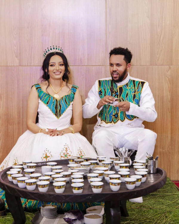 Glamorous Green Traditional Habesha Couples Attire: Handmade Black Accents Matching Outfit