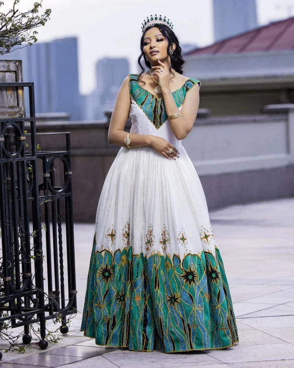 Glamorous Green Traditional Habesha Couples Attire: Handmade Black Accents Matching Outfit