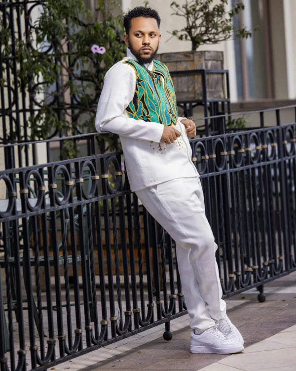 Glamorous Green Traditional Habesha Couples Attire: Handmade Black Accents Matching Outfit