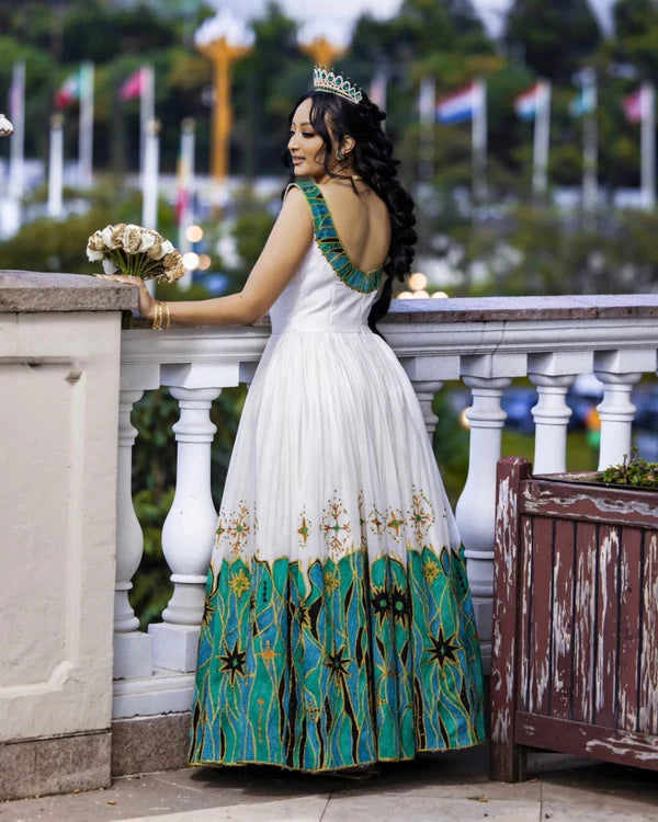Glamorous Green Traditional Habesha Couples Attire: Handmade Black Accents Matching Outfit