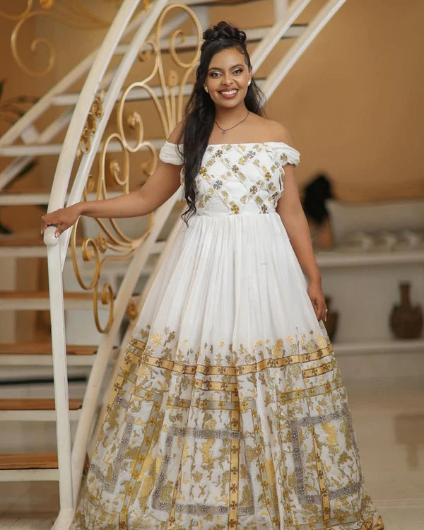 Shimmering Golden Habesha Traditional Couples Outfit: Elegant Look with Your Beloved in Matching Habesha Attire