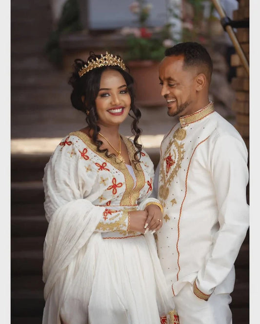 A Perfect Pair in Red Habesha Couples Outfit Meticulously Designed Habesha Couples Attire