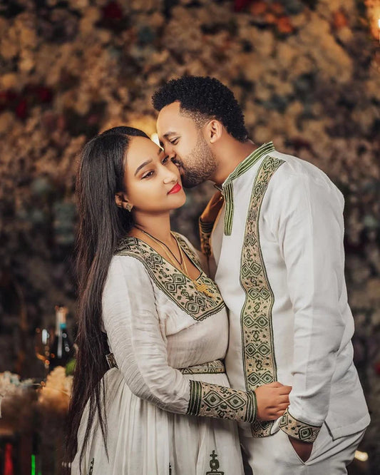 Silvered Elegance with Matching Habesha Couples Outfit: Majestic Wedding Ensemble