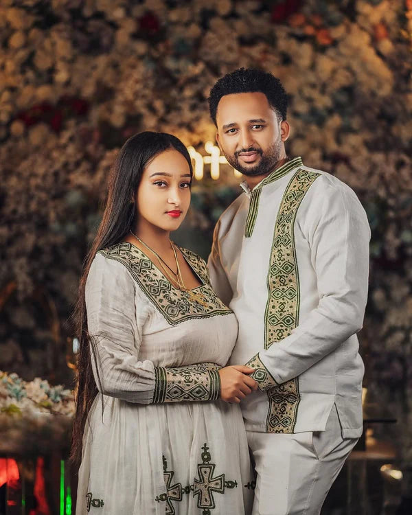 Silvered Elegance with Matching Habesha Couples Outfit: Majestic Wedding Ensemble