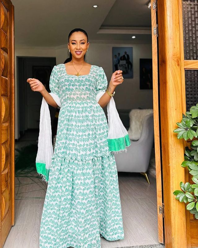 Chic Azure Chiffon Gown Effortless Grace Habesha Chiffon Attire.
