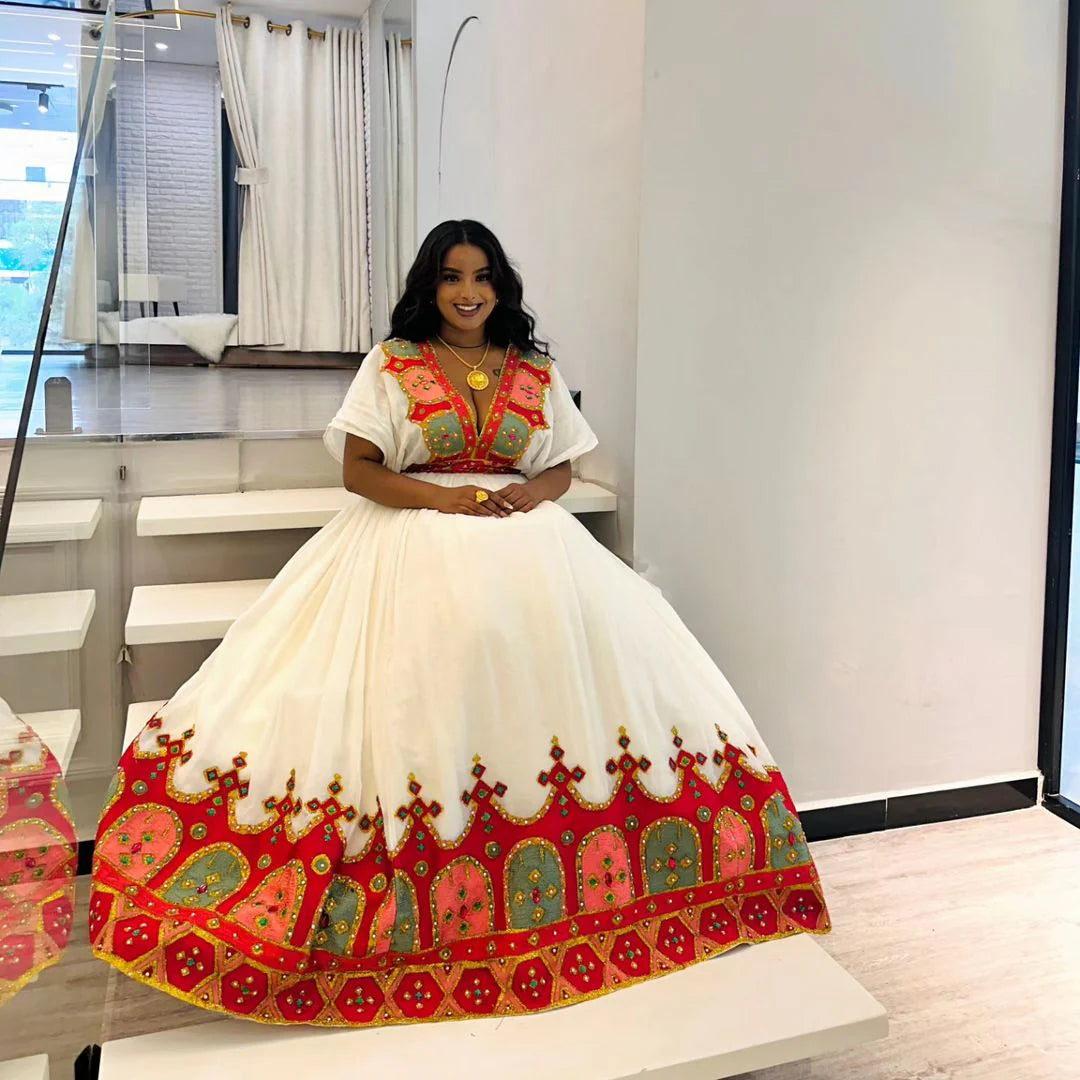 Crimson Beaded Elegance: Contemporary Habesha Dress in Traditional Style