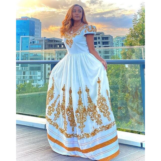 A luxurious full tilf Habesha Wedding kemis crafted from rich Menen fabric