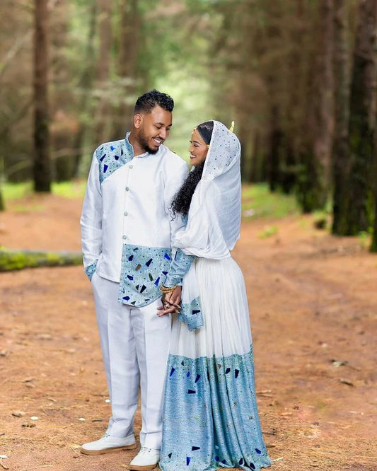 Stunning Blue Habesha Couples Outfit, a vibrant matching ensemble perfect for Wedding