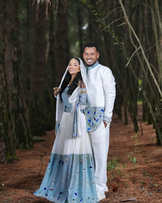 Stunning Blue Habesha Couples Outfit, a vibrant matching ensemble perfect for Wedding