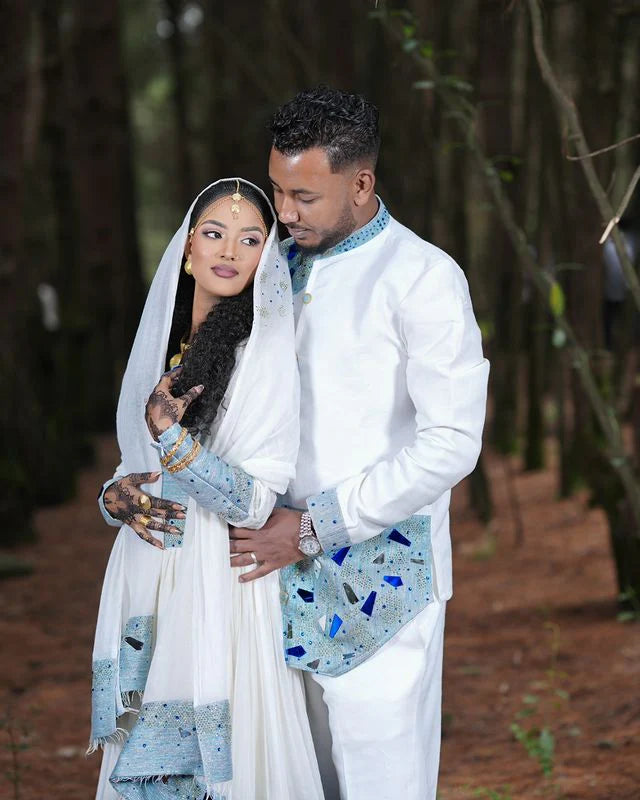 Stunning Blue Habesha Couples Outfit, a vibrant matching ensemble perfect for Wedding