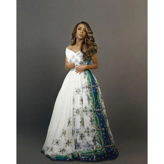 The Royal Menen Wedding Dress A stunning Habesha garment with Tilf embroidery and beads, showcasing cultural artistry