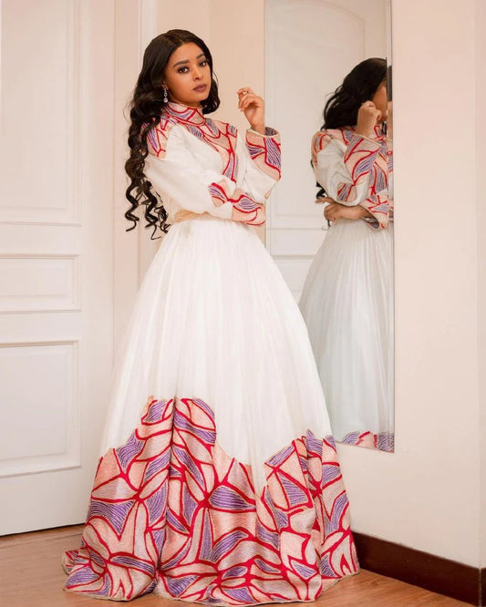 Tilf Elegance An exquisite Habesha Wedding dress made from Menen fabric, showcasing beautiful artistry