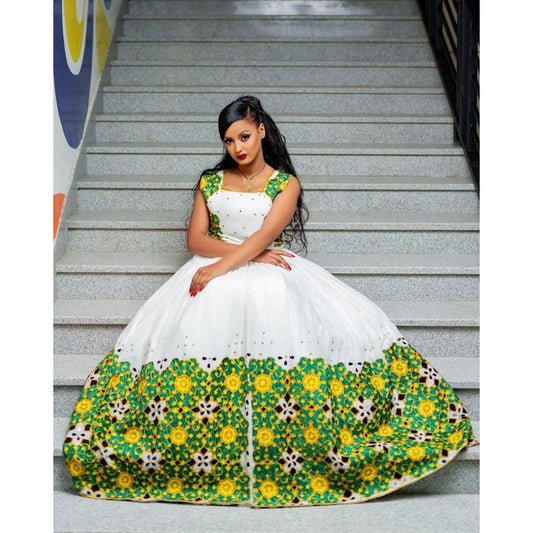 A beautiful Habesha kemis adorned with intricate Tilf designs