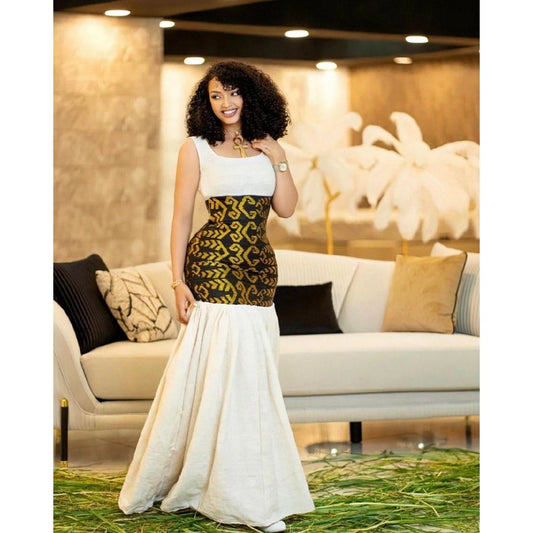 Elegant shimena and gabi Habesha dress with intricate Tilf design at the waist