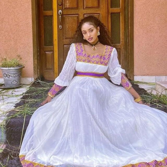 A Lavish Menen Textile Habesha Garment with a Modern Flair