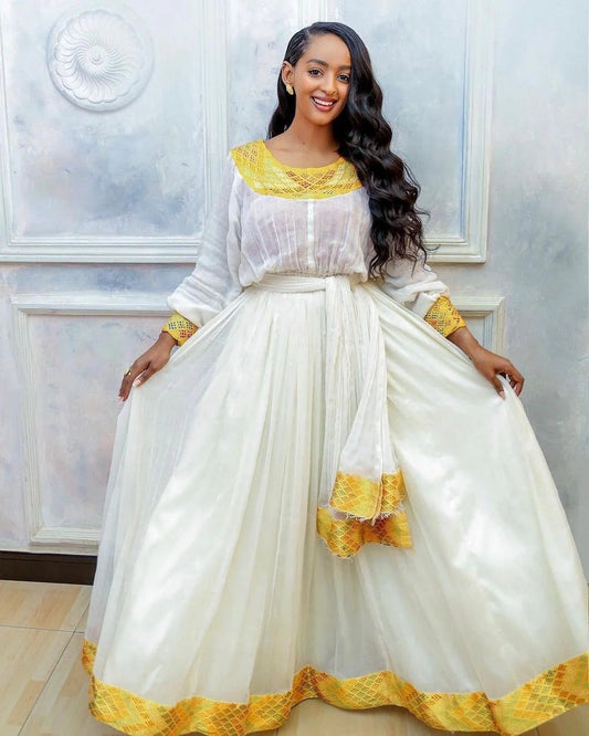 Stylish Yellow Modern Habesha Dress with a unique Habesha Kemis design