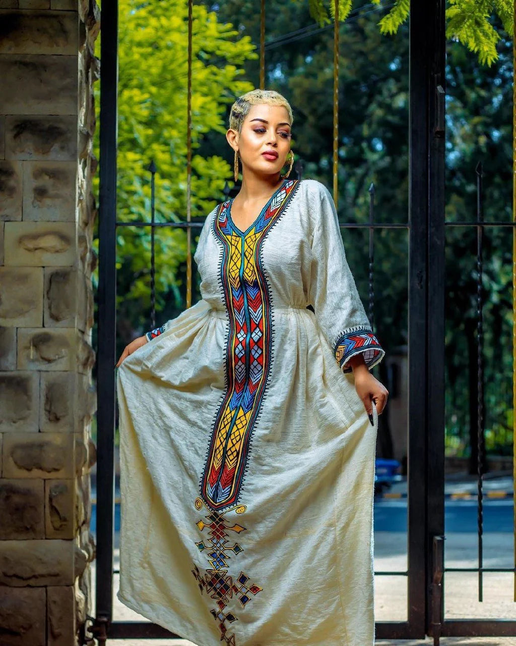 A stunning Fetil Habesha Kemis featuring intricate Tilf patterns and a beautiful Habesha libs design