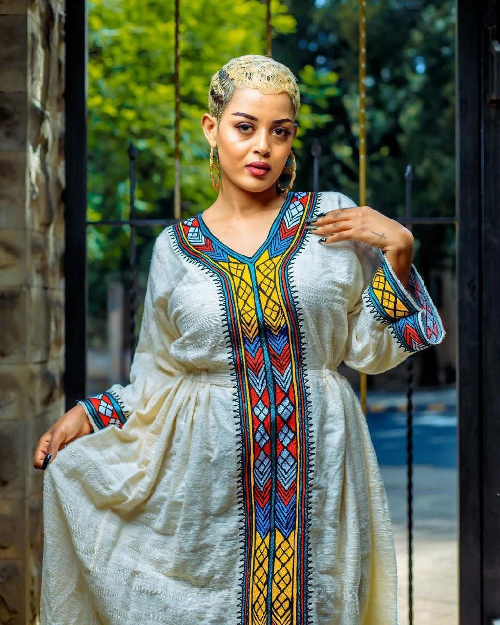 A stunning Fetil Habesha Kemis featuring intricate Tilf patterns and a beautiful Habesha libs design