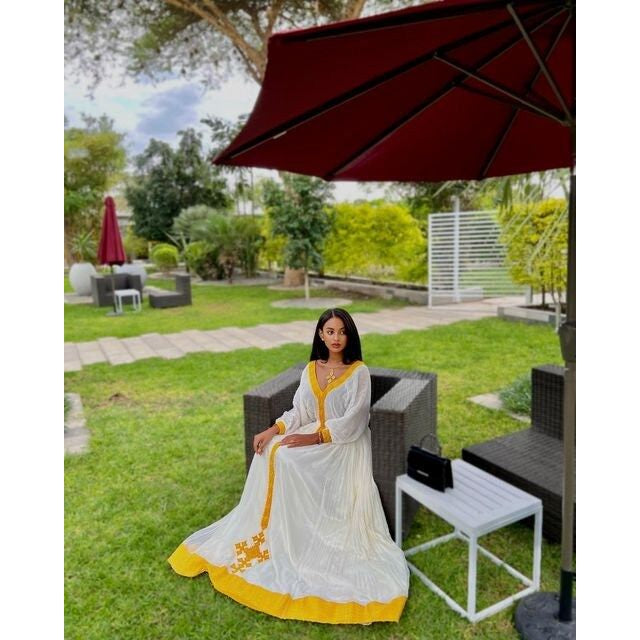 A Radiant Yellow Tilf Habesha Dress