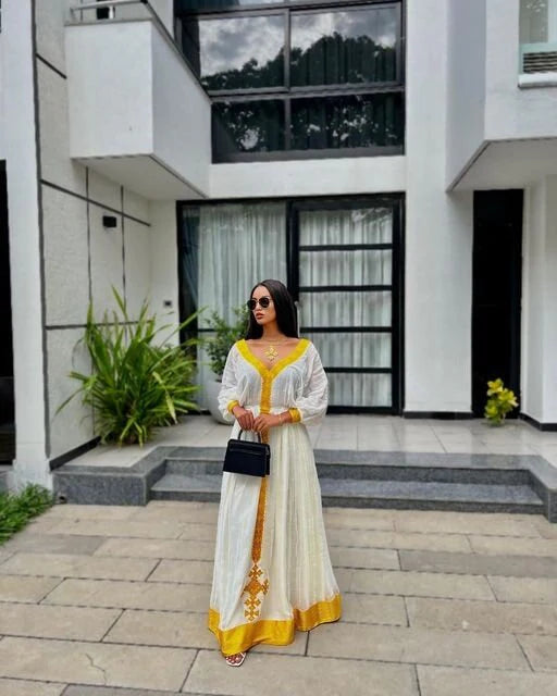 A Radiant Yellow Tilf Habesha Dress