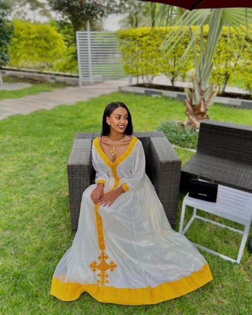 A Radiant Yellow Tilf Habesha Dress