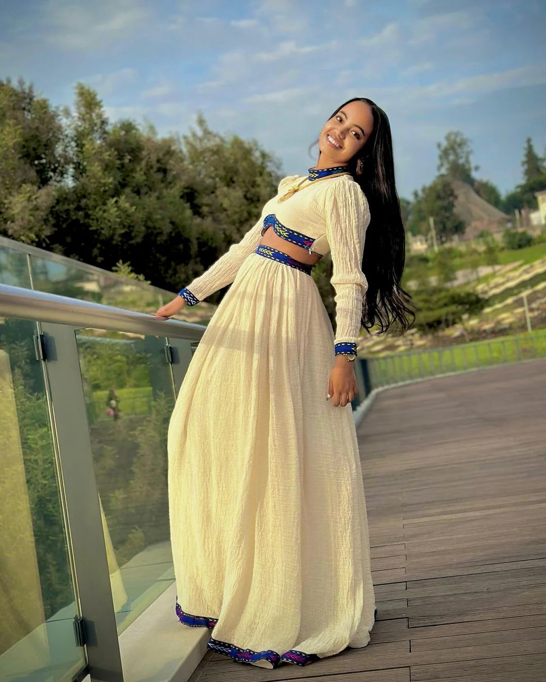 A chic Habesha two-piece stylish crop top and flowing skirt
